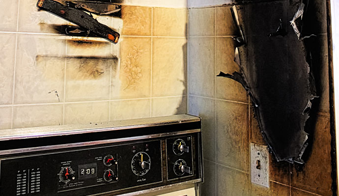 damaged walls after kitchen smoke & fire